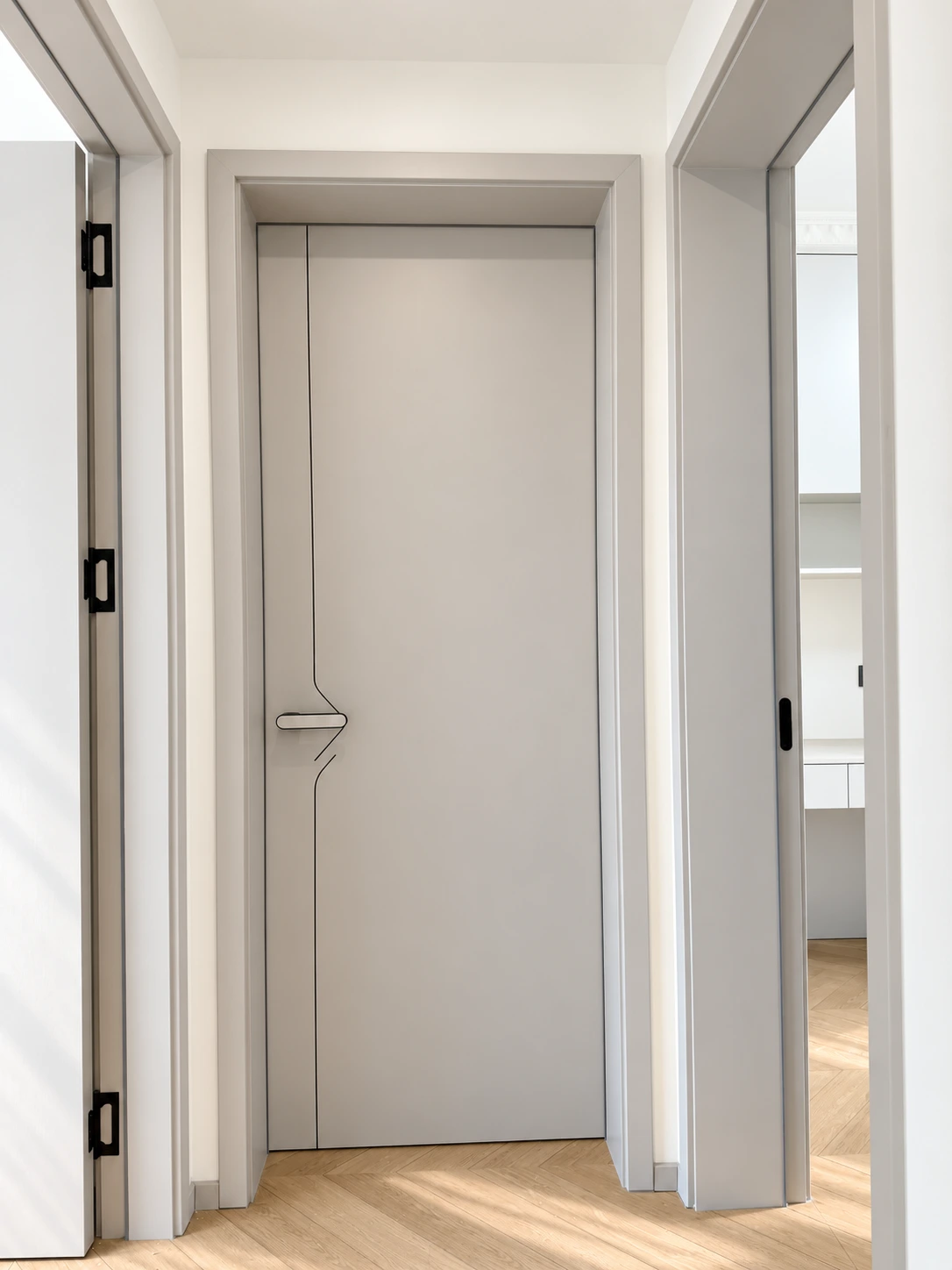 Tall interior door installed at the end of a residential hallway